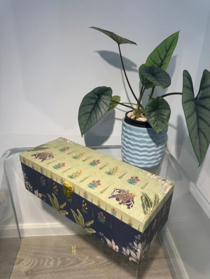 Navy and cream rectangular 3-jar gift box with elephant and botanical prints, gold latch